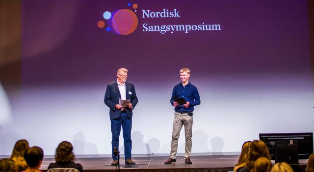 Patrik och Jarle på scenen under Nordisk Sångsymposium 2023 i Oslo